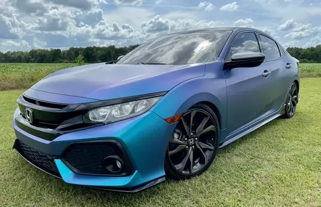 The car in the image is a 10th-generation Honda Civic (2016–2021)