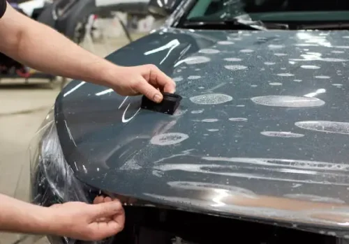 image about car surface preparation before black car vinyl